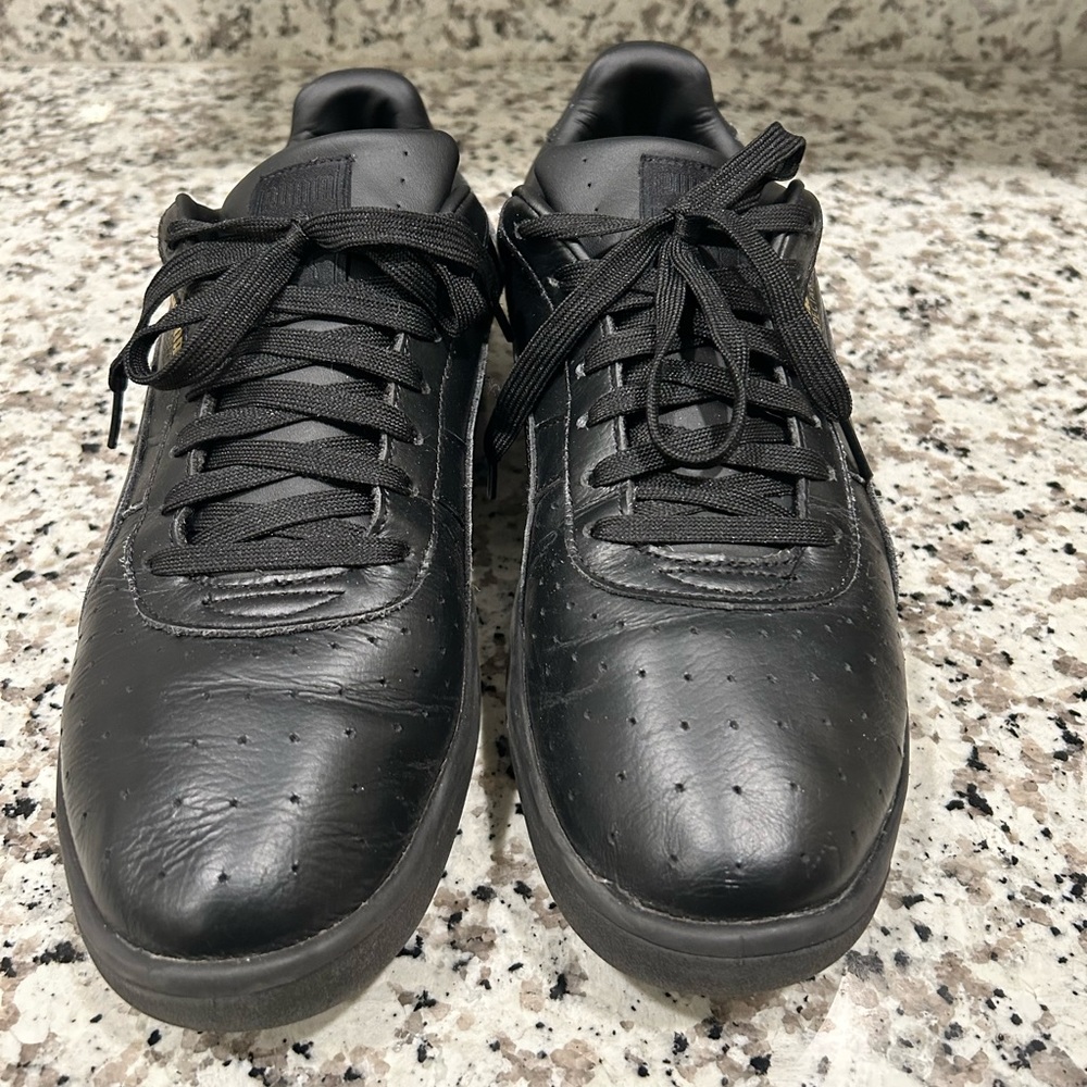 Black on Black pre owned Pumas